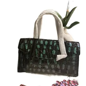 Iridescent Handbag - Black and Green Patterned Design Handbag as shown with purple and green iridescent color.