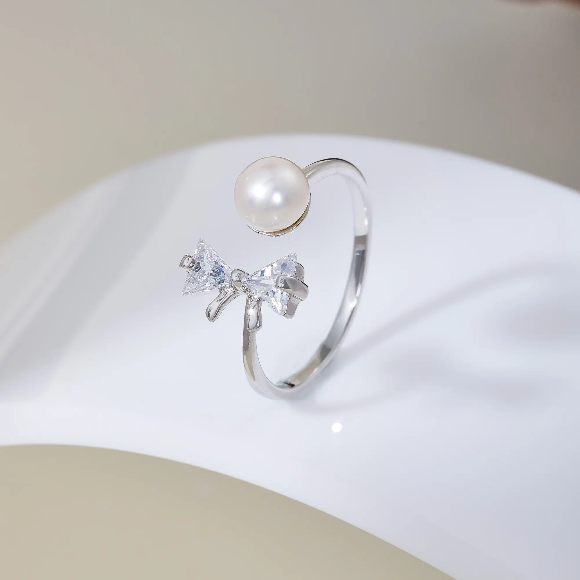 EAMTI 925 Sterling Silver Pearl Rings Fashion Bow Adjustable Branch Rings White Fresh Water Pearl Rings Open Cubic Zirconia Bowknot Engagement Rings for Women