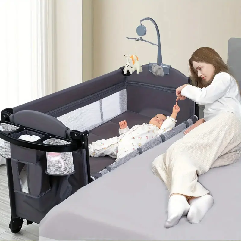 5-in-1 Baby Bedside Sleeper Playard – Bedside Crib, Electric Rocking Bassinet, Diaper Changer, Blackout Cover, Mattress, Music, Storage, Remote Control, Automatic Newborn Lounger, Toddler Bed, Holiday Gift