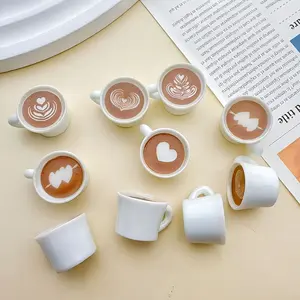 Set of 12 Resin Coffee Charms Featuring a Heart-Shaped Layered Coffee Design, Perfect for Pendant Earrings And Necklaces. Ideal for Both Coffee Lovers And Art Aficionados As Jewelry Components, These Additions Include Coffee Earrings