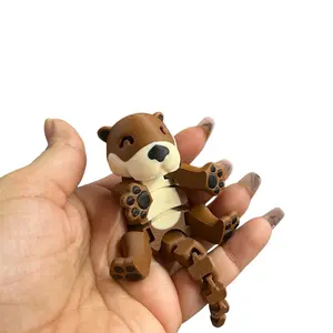 3D printed articulated multicolored Otter figurine done in PLA Plastic
