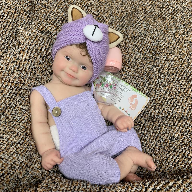 18-inch Rebirth Doll Full Body Soft Silicone Realistic Newborn Girl Doll with Purple Cat Ears Clothes Accessories Perfect Christmas Gift for Collections Holidays Birthdays Halloween Suitable for Children Over 3 Yearsold