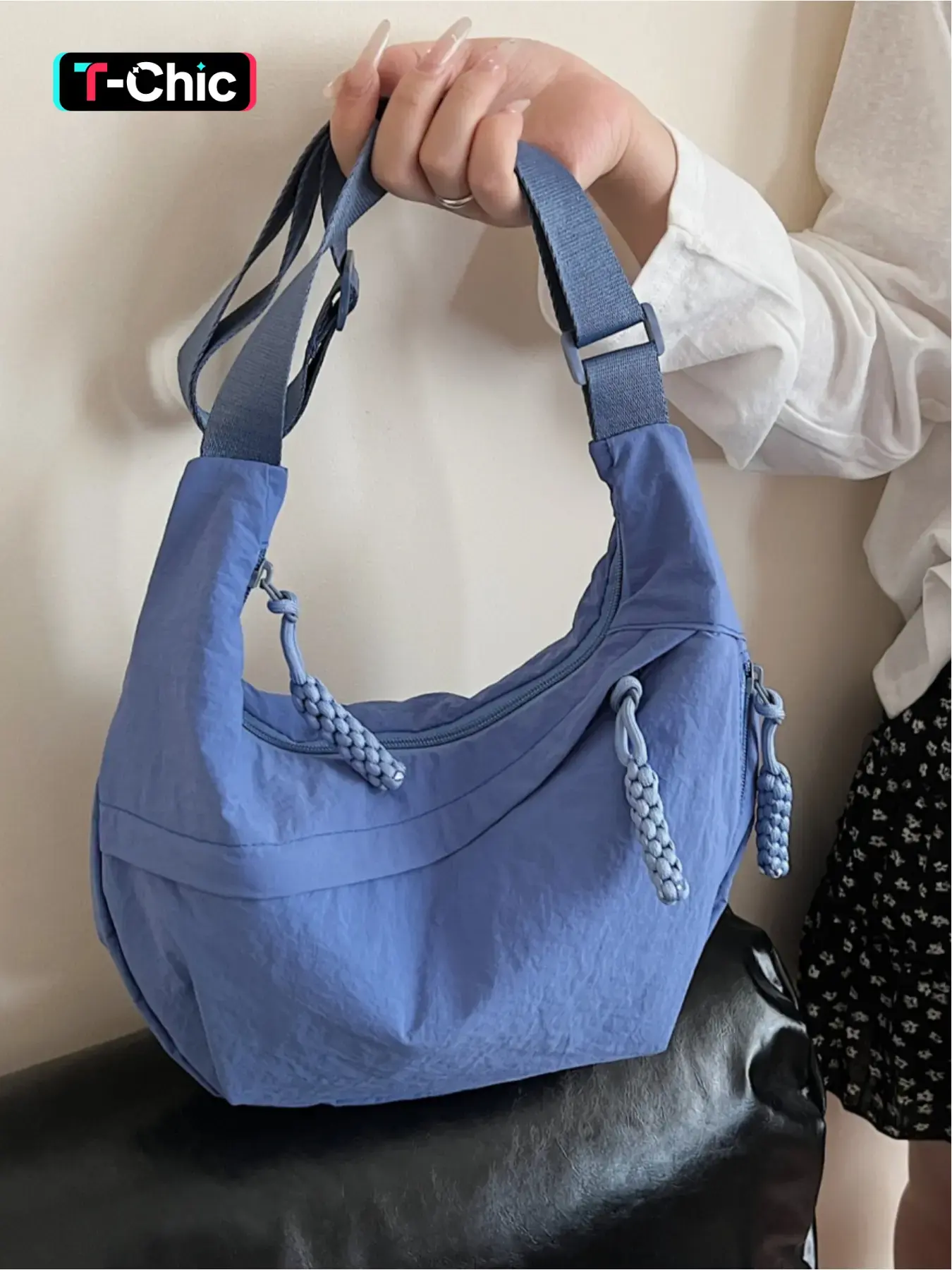 Lightweight pleated nylon crescent bag with woven tassel embellishments, Lightweight shoulder bag, versatile crossbody bag for work commutes, Casual crossbody, Zipper closure, Suitable for commuting, shopping, dates, and everyday accessories, Unique Bags
