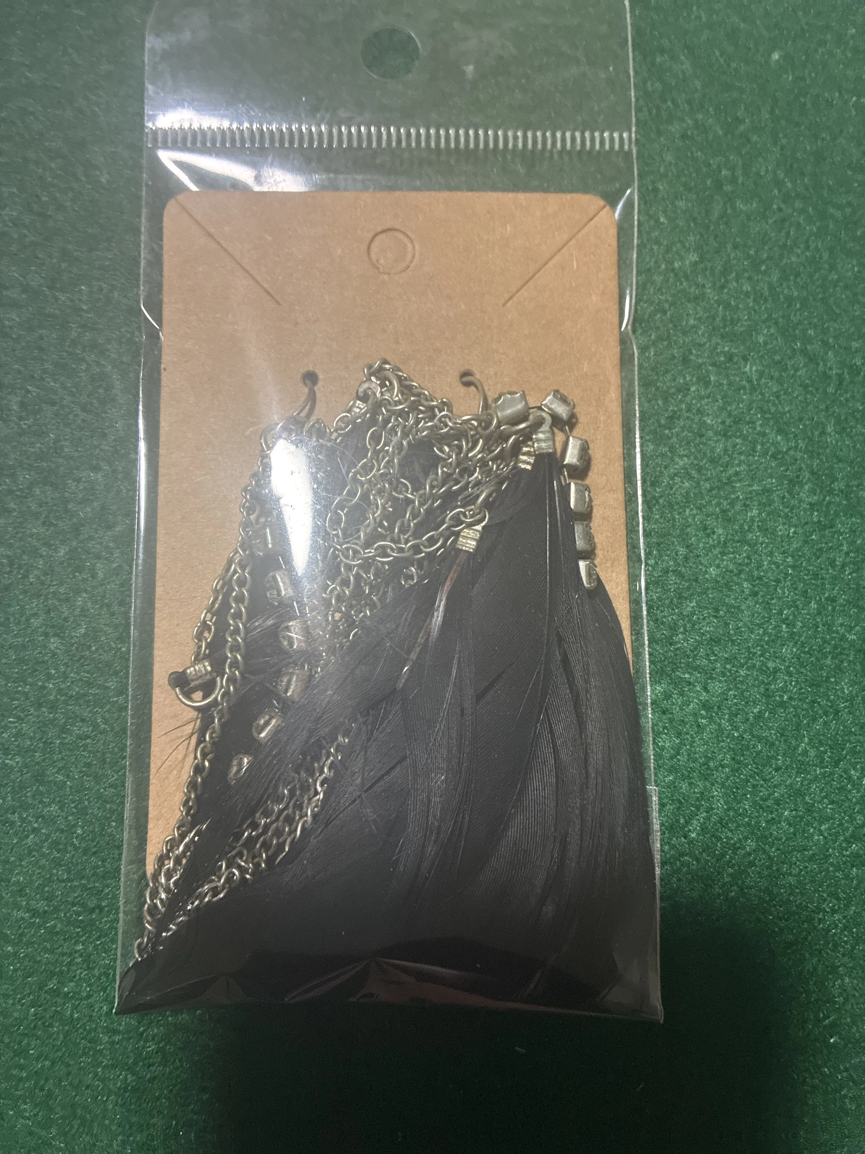 Black feather silver earrings