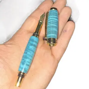 Turquoise Curly Maple Tycoon Gold Fountain Pen with Elegant Design and Smooth Writing Experience