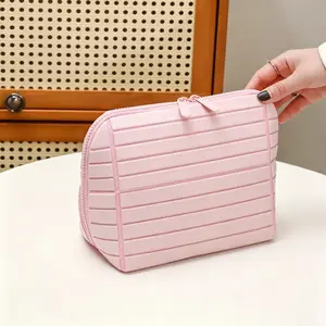 Women’s foldable waterproof striped toiletry bag — large-capacity compartmentalized makeup/cosmetic storage box with a stylish multi-compartment design, top zipper for easy access and portability—ideal for travel.