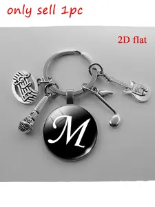 1pc Music Time Gem Keychain, Featuring a Microphone Guitar And a Small Pendant with Music Symbols - a Perfect Gift for Music Lovers. It'S a Glass Keychain with a Letter Design