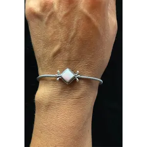 Pink Conch Twisted Wire Cuff by Mike Smith, Navajo