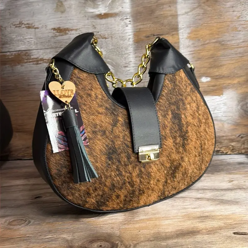Cowhide and turquoise embossed leather shoulder bag