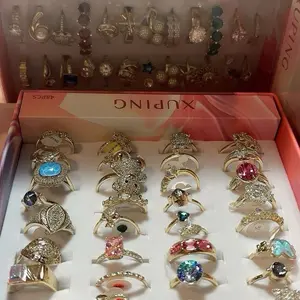 Caja de 48 anillos oro laminado xp