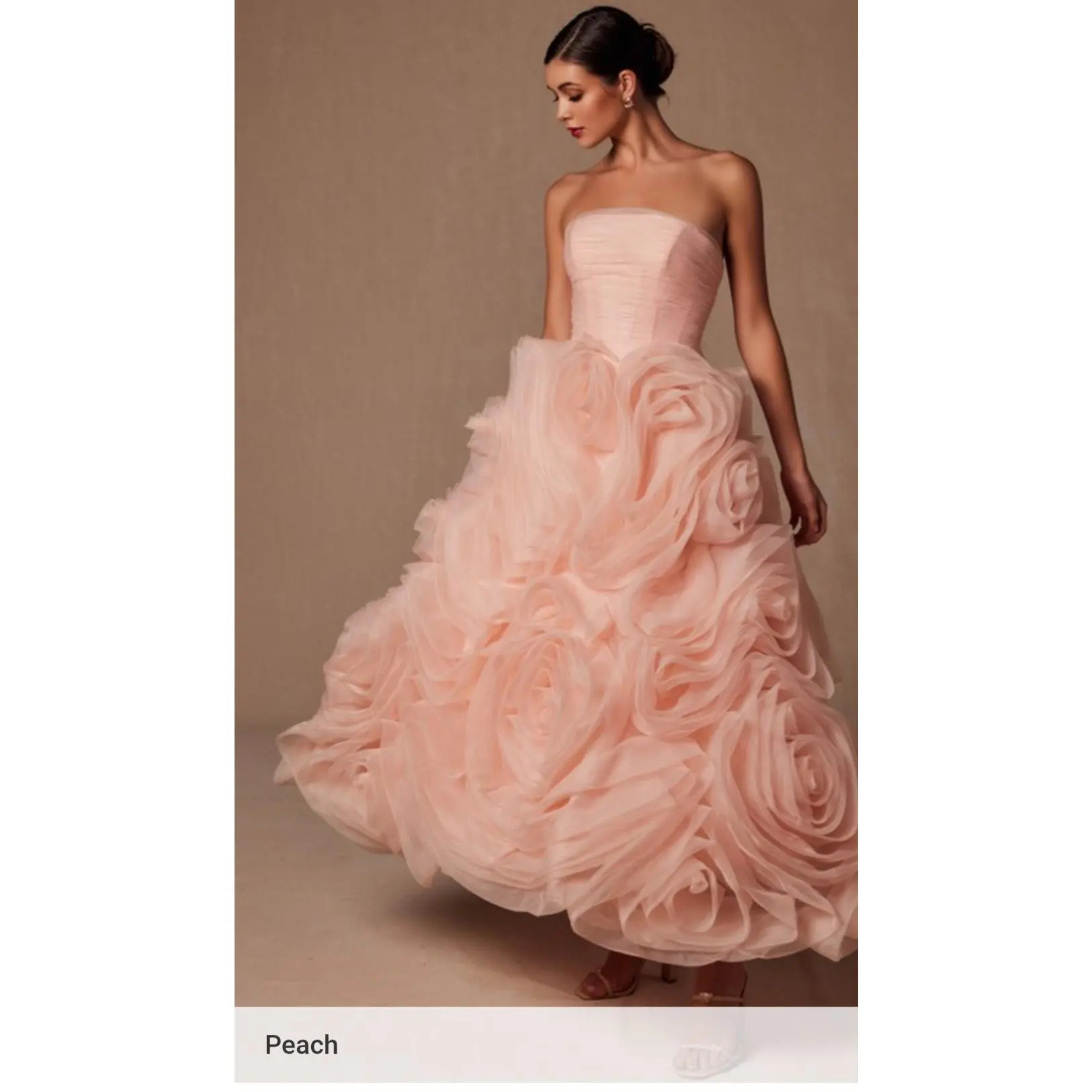 STRAPLESS ROSETTE RUFFLE GOWN