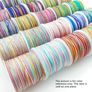 New DIY handmade braided cord-like thread bracelet, knots, tassels - sewing tape and thread