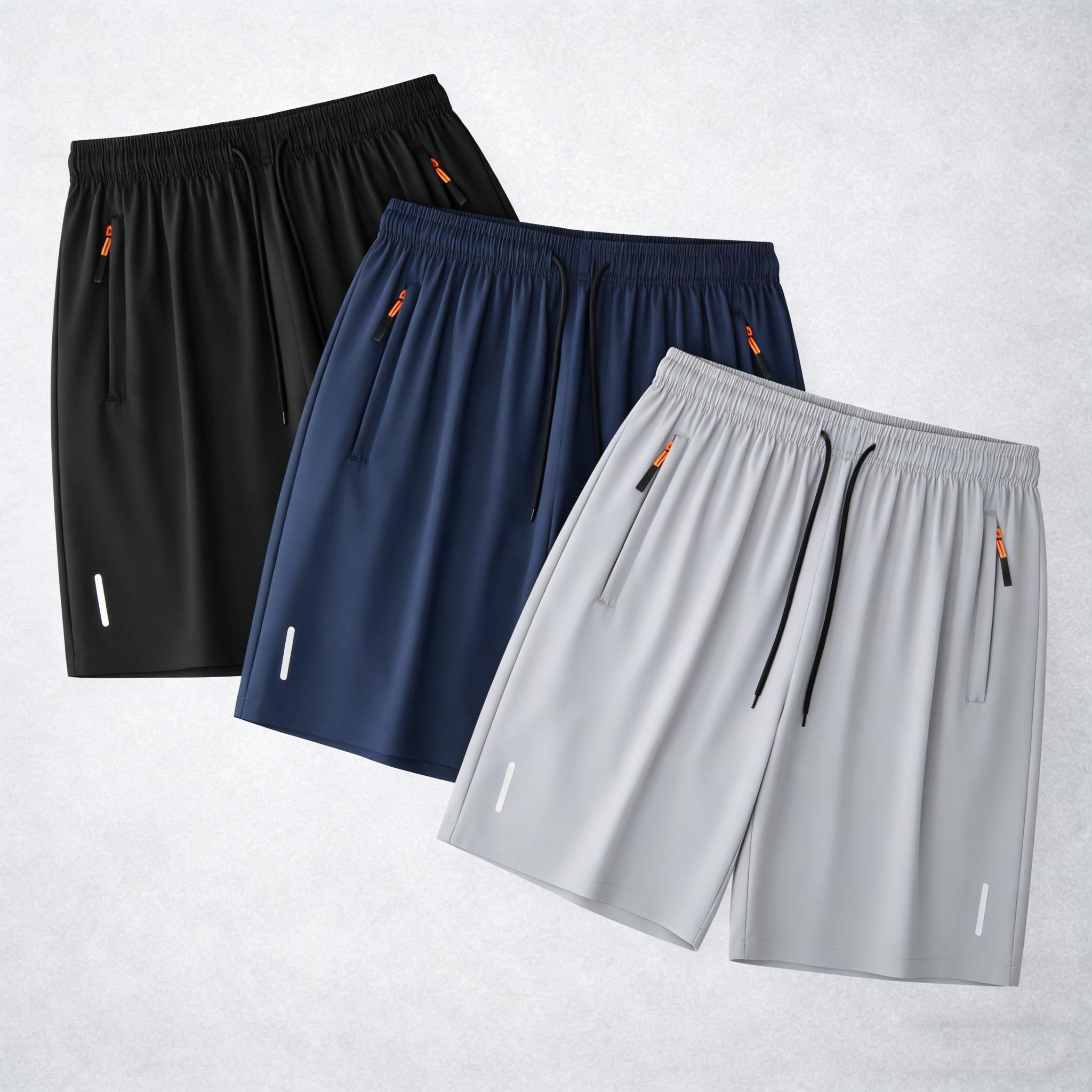 7-pack men’s ice silk quick-dry athletic shorts featuring zippered pockets and contrasting zipper head design; breathable, lightweight ice silk summer shorts for fitness, running, and casual wear—an essential for workouts and comfortable for home wear in