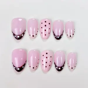 Handmade black polka dot and round dot nail art pieces, short almond-shaped nails, French-style white nail-on fake nails