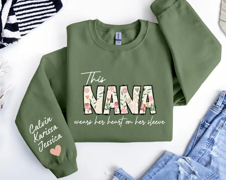 Nana Sweatshirt, Custom Nana Sweater, This Nana Wears Her Heart On Her Sleeve Sweater,With Kids Name On Sleeve,Custom Grandma Gift,Nana Gift