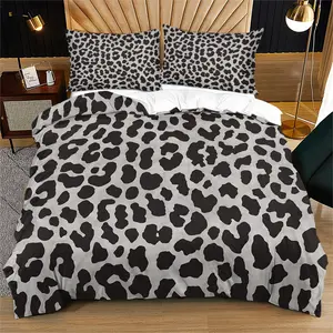 Leopard print gray and black patterned bedding set,  cover and pillowcase combination, creating a wild and luxurious bedroom décor.