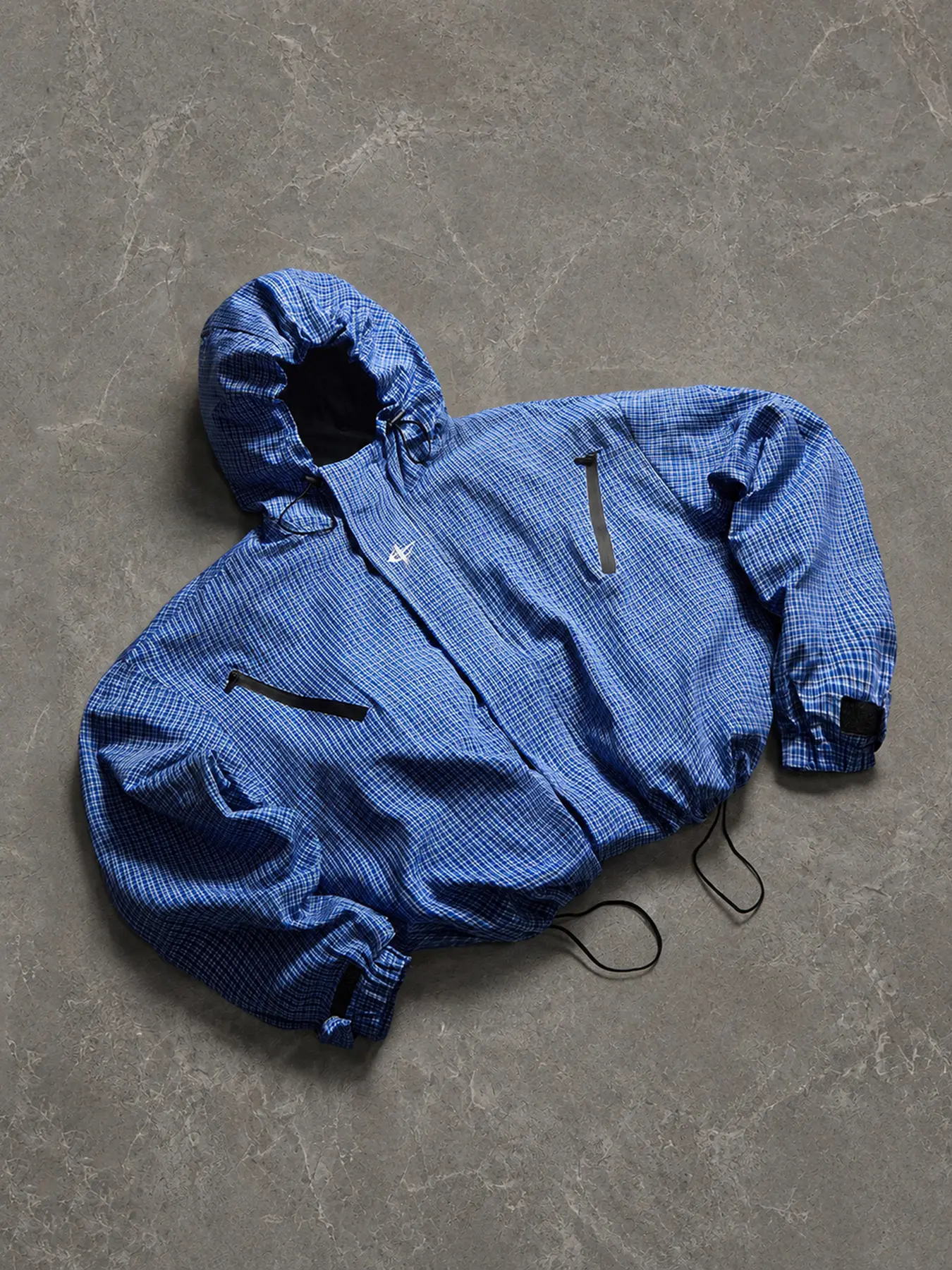 Men's Checkered Hooded Windbreaker  A casual jacket featuring a zippered chest pocket and an adjustable hem, perfect for everyday wear on campus