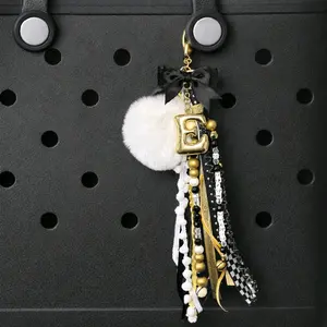 Junk Keychain in Black Gold Glitter and White Ribbon with Specialty Initial and Black Bow for Stylish Accessories