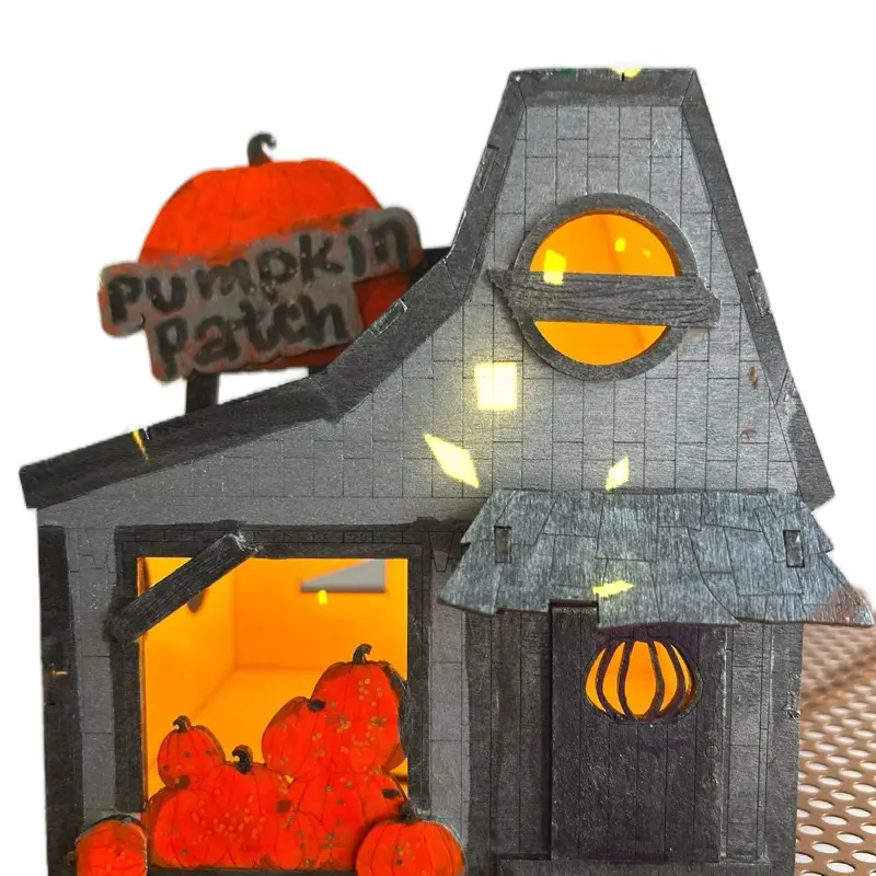 Light-up Pumpkin Patch Haunted House Decor with Glowing Windows and Orange Pumpkins for Halloween