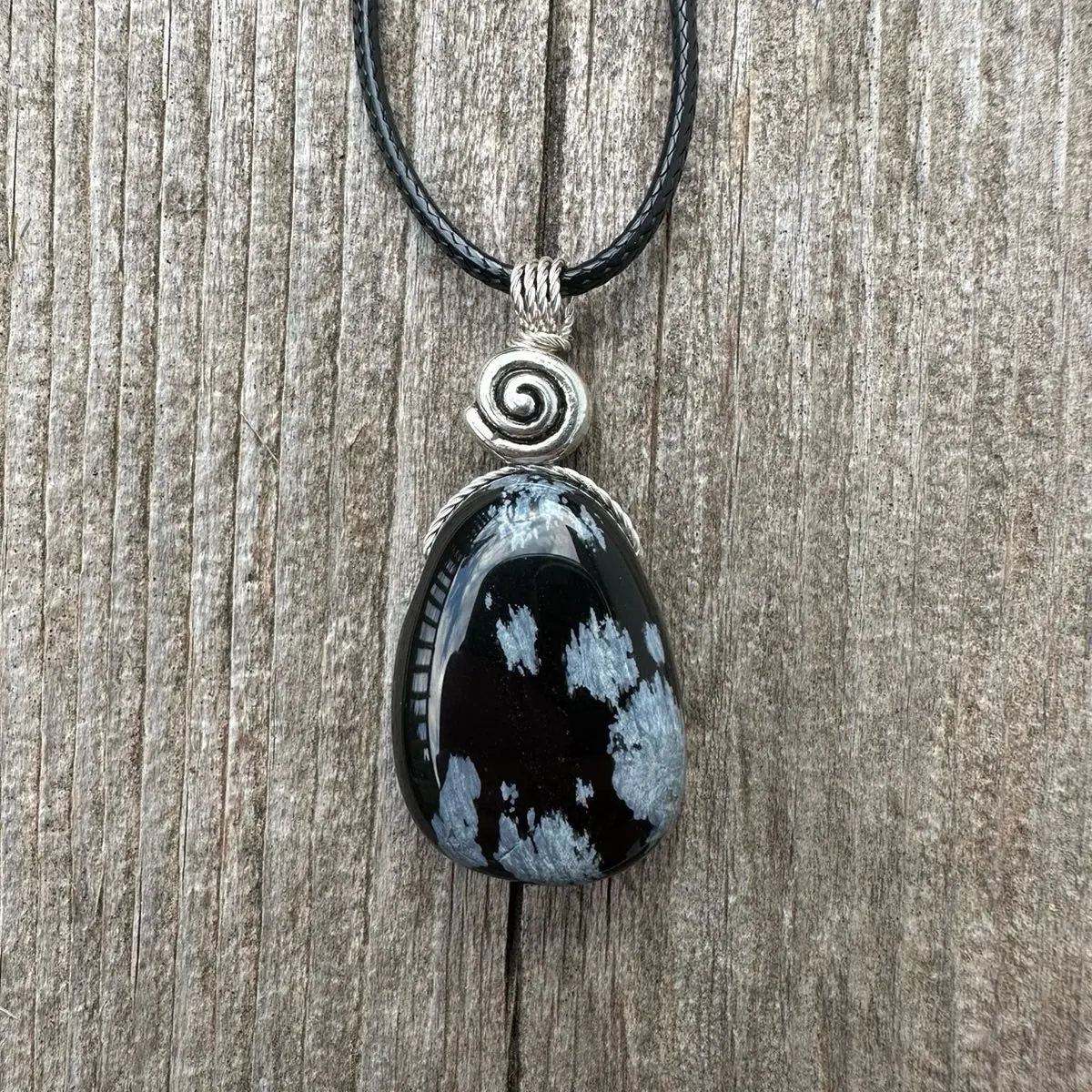 Snowflake Obsidian for Balance, Connection to Sacral Chakra and Meditating. Swirl to Signify Consciousness.