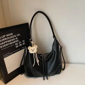 Retro Dark Brown Crescent Hobo Bag with Cute Bear Pendant Trendy Niche Crossbody Shoulder Bag for Students Daily Commute Soft Vintage Vibes Y2K Aesthetic
