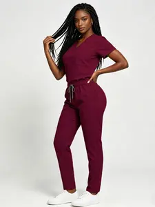 Women's Stretch Scrubs Set That Breathes! Featuring a trendy wide-leg style with multiple pockets, this smooth, quick-drying Workwear uniform lets you say goodbye to wrinkles & stuffiness for work and beyond.