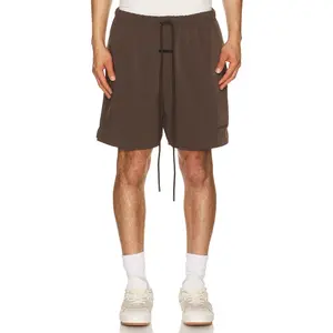 Fear of God ESSENTIALS Active Trace Classic Short in Brown