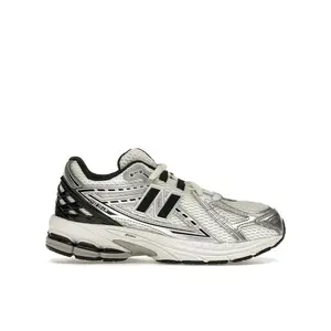 New Balance Kid's 1906R Silver Metallic Black, from StockX New Balance Kid's 1906R Silver Metallic Black, from StockX