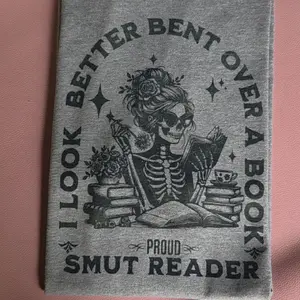 Bent over a book tshirt