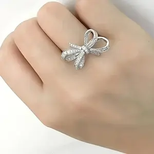 Fashionable three-dimensional zircon bow ring, elegant alloy material, women's declaration wedding ring, luxurious anniversary gift, fashionable jewelry, no need for power supply,  shrunken head chain alumni watch halo rings belliwelli