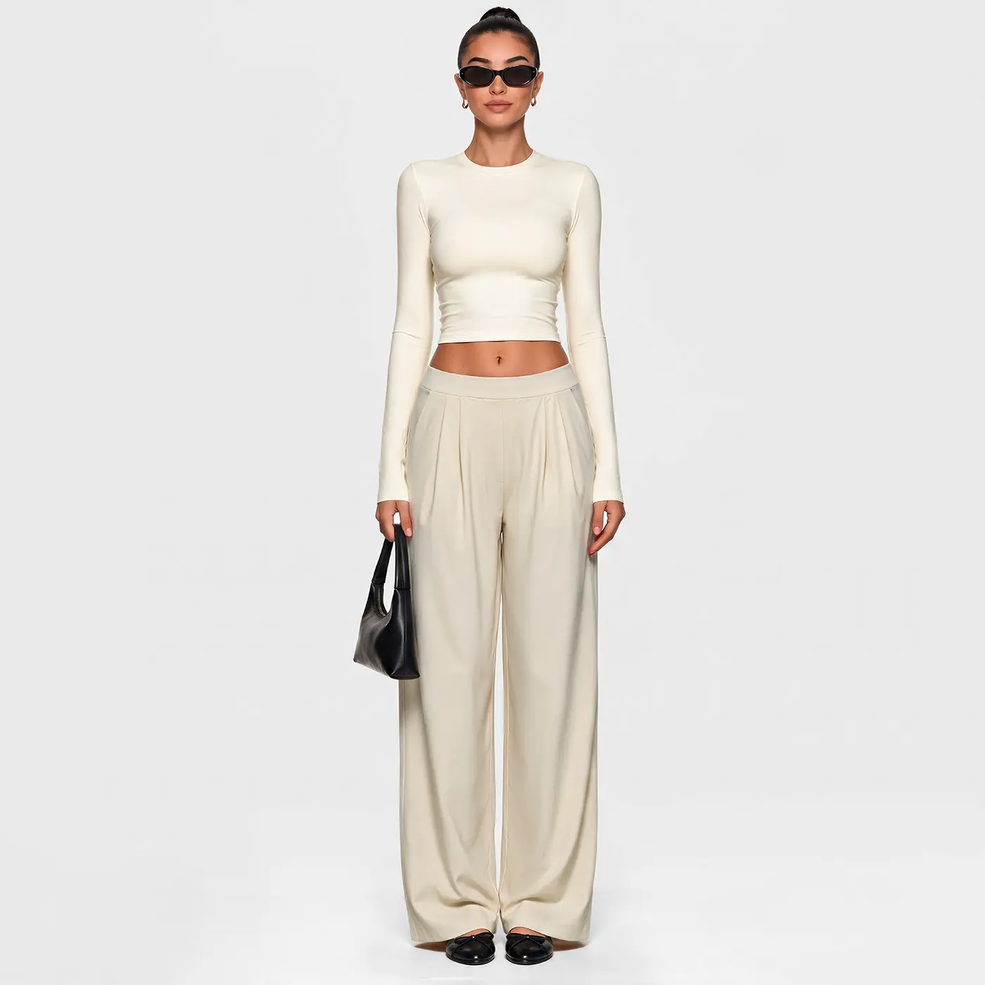 Dr. PEAR premium clean-style coordinated set featuring a slim-fit long-sleeve cropped top and elastic-waist pleated wide-leg pants—versatile for everyday wear.
