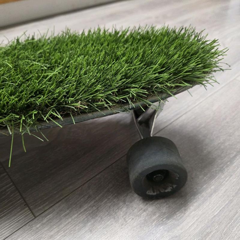 The Original Lawngboard Longboard with Realistic Grass Deck and Durable Wheels for Outdoor Use