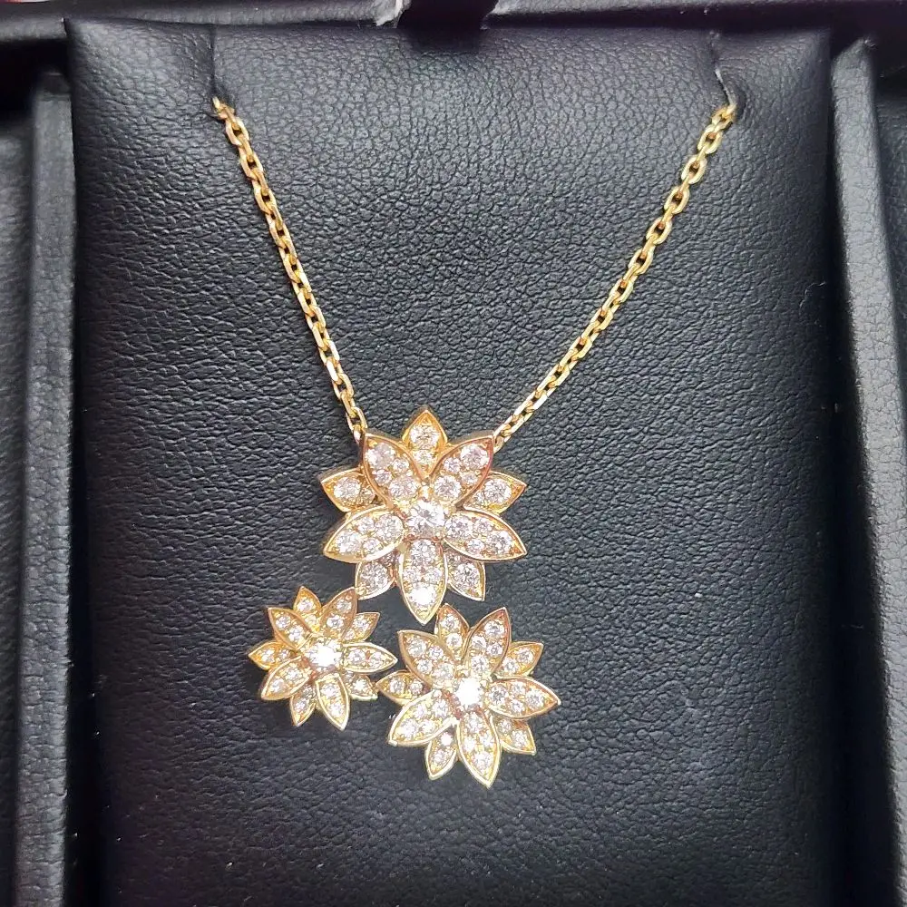 Cadena de flores de diamantes 18k