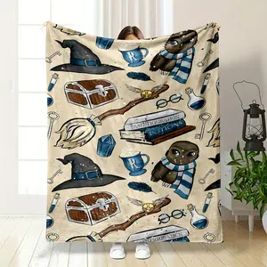 This blanket is covered with Harry Potter themed elements, including wizard hats and owls in Ravenclaw school colors, as well as classic magic items like magic brooms, Golden Snitches, magic books