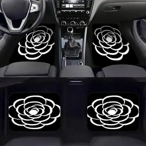 A set of four car floor mats, designed specifically for SUVs or sedans, featuring a blooming camellia pattern that exudes elegance. They are easy to maintain and make a great gift for car owners, suitable for family vehicles.