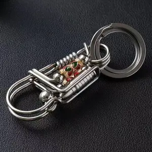 Dog Tag Lockjaw Keychain with Durable Metal Construction and Secure Clasp for Everyday Use - Punk Aesthetic Stainless Steel Ball Pendant, Handcrafted Artistry