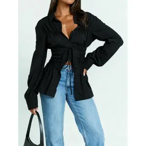 Women's top with collar, drawstring, long sleeves, buttons, and waist cinched shirt top