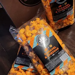 Junior Snacks Co. Caramel & Cheddar Popcorn Mix;  Crunchy Brown Sugar Salt Flavor combined with a Soft Cheddar bite