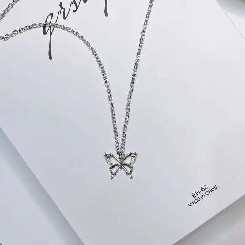 Cross chain hollow butterfly pendant sil