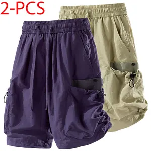 Summer cooling solid-color cargo shorts with drawstring elastic waistband and multiple pockets; American high-street casual loose fit, knee-length; quick-drying; suitable for outdoor sports and everyday wear; unisex.