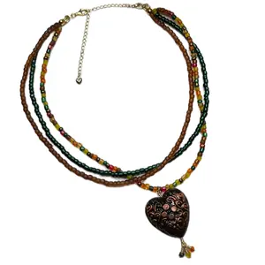 Yassy Creates | Pumpkin Spice Heart Necklace | Colorful Beads and Intricate Heart Pendant Design