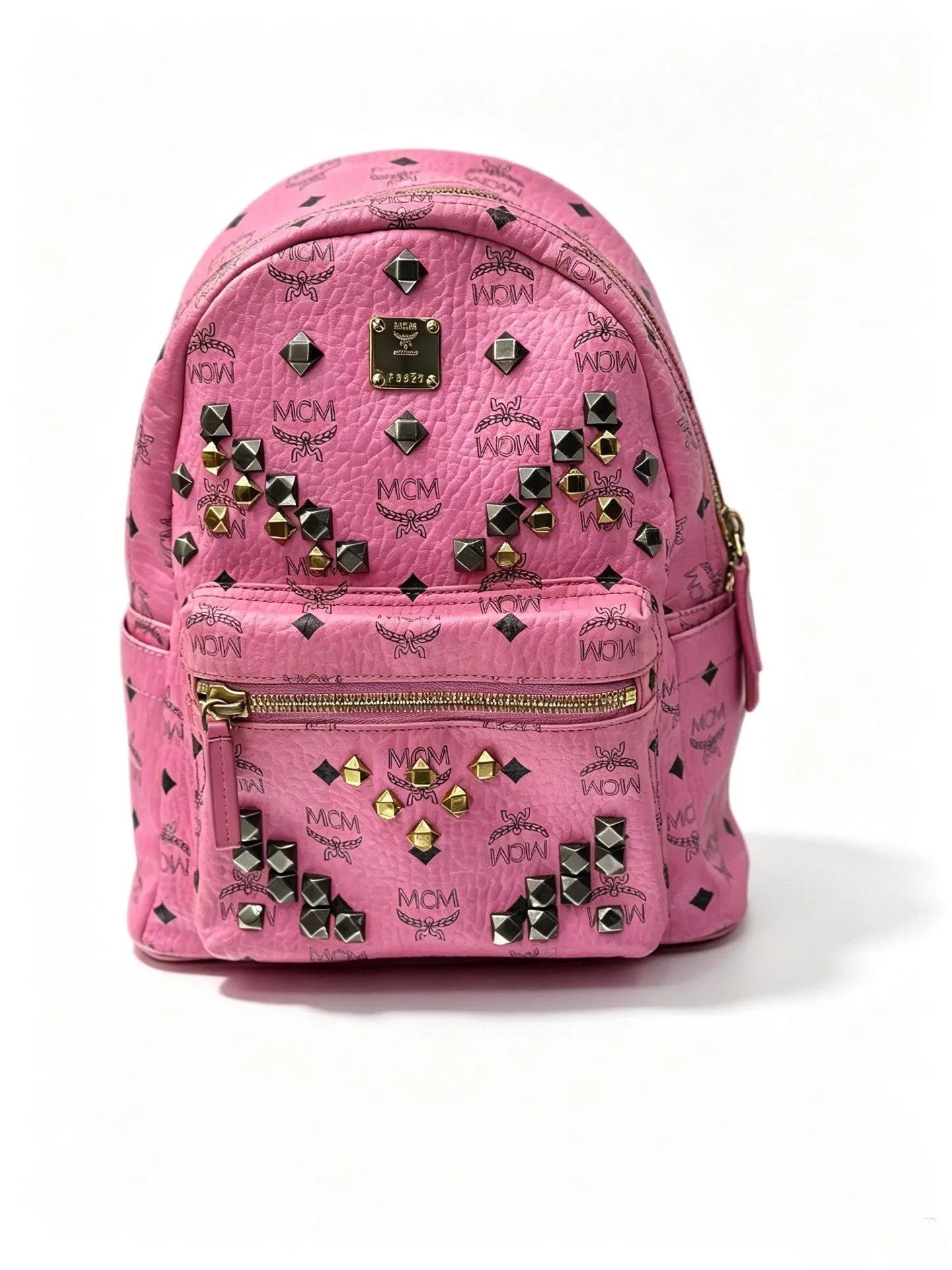 Pre-owned Leather Backpacks MCM Stark Visetos Studded Backpack in Pink with Multicolor Crystal & Pyramid Stud Embellishments