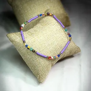 Ankle brazalet con murrinas, fimo morado y balín de rodio