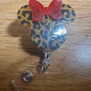 Leopard Mouse w bow badge reel Leopard Mouse w bow badge reel