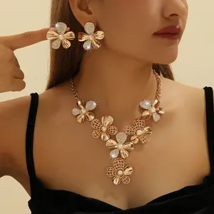 ChicMe Women's White rhinestone metal flower necklace and earring set, made of zinc alloy.