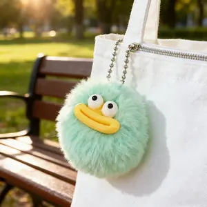 Quirky Round Fluffy Ball Charm Goofy Expression Faux Fur Keychain for Gym Bags Wallets Car Accessories & Phone Cases Soft Textured Fun Gift