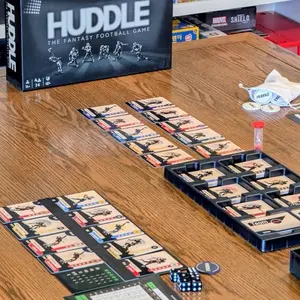 Huddle The Fantasy Football Game - An interactive and strategic board game experience that’s brings the competition and trash talk of fantasy football to game nights!