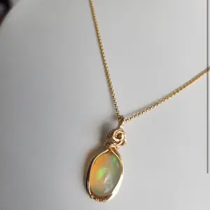 Handmade Gold Wire wrapped Ethiopian Opal