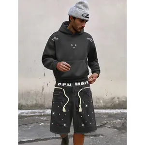 Men’s black raw-hem denim shorts with rhinestone embellishments, summer drawstring waist design, street-style casual versatile shorts—a trendy wardrobe essential.