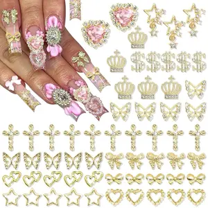 180PCS Gold Nail Charms: Cross Crystal Star, 3D Gold Butterfly, Sparkly Crown, Shiny Dollar Sign, Bling Cross Bowknot Starlight for Nail Art and DIY